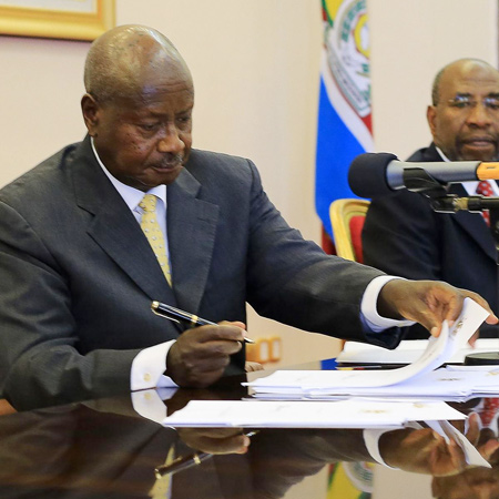 President Yoweri Museveni signs the Anti-Homosexuality Bill into law Source - uhem-mesut.com