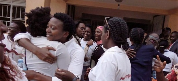 Susan Mirembe Nalunkuma, Head of Policy and Research at Chapter Four Uganda hugs a colleague shortly after her release from detention at Kiira Division Police Headquarters. She, and other 24 women activists were arrested on September 13, 2016 during a police crackdown on a peaceful prayer meeting convened to protest the proposed extension of the age limit for judicial officers. 